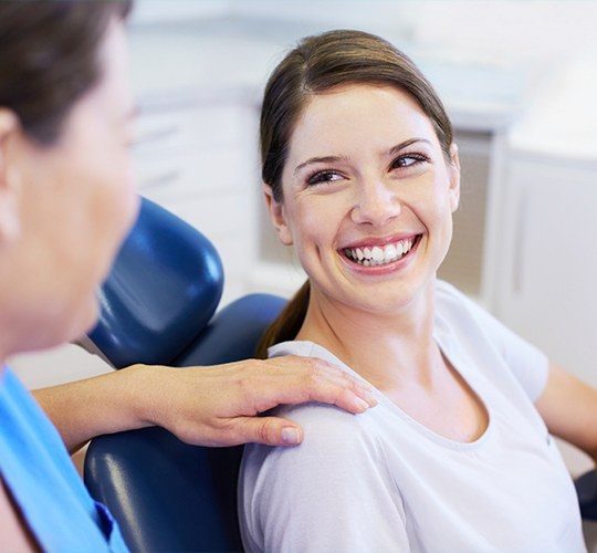 woman smiling at dentist