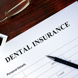 dental insurance form on table