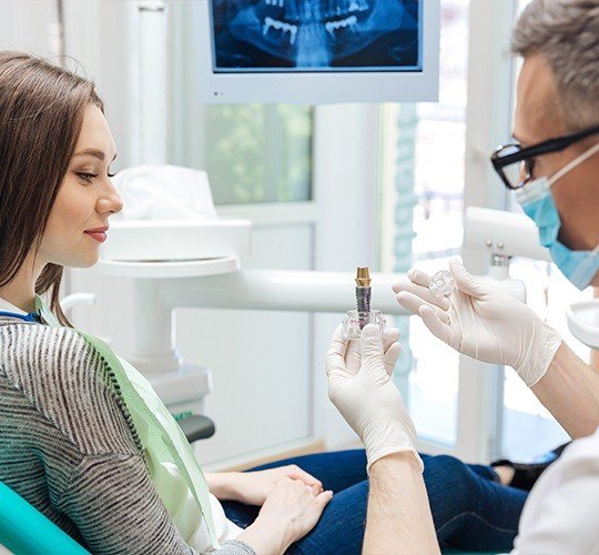 woman looking at implant