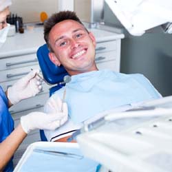 Man visiting dental office in Westport for a routine checkup
