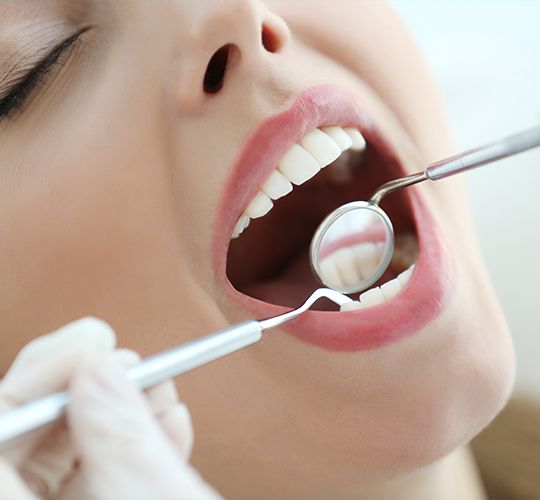 woman getting periodontal therapy
