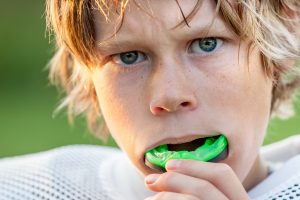 child with mouthguard