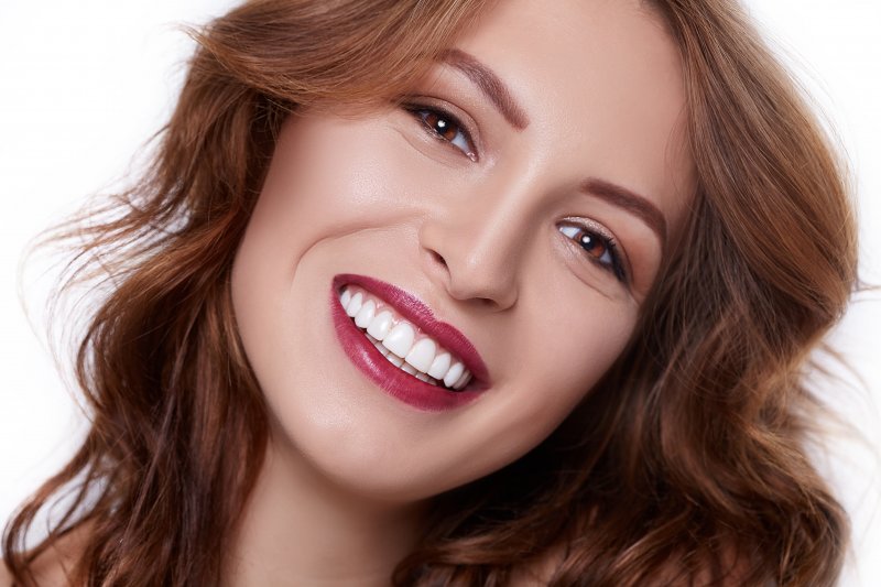 a woman with veneers