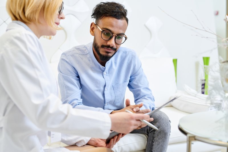 man inquiring about a smile makeover