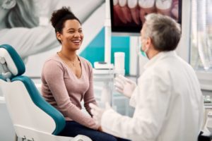 woman talking to her dentist 