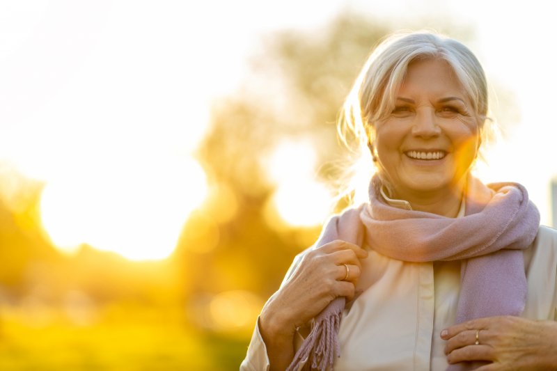 woman smiling with dental implants